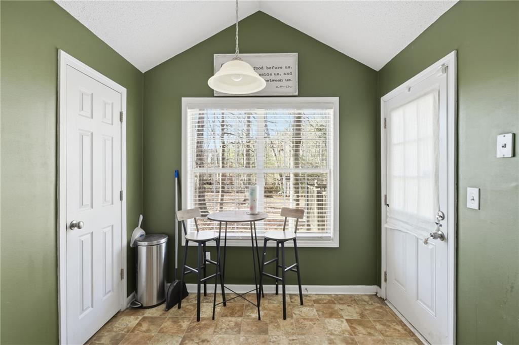 355 Radcliffe Trace Covington, GA 30016 - Photo 10 of 28 a view of a livingroom with furniture and window