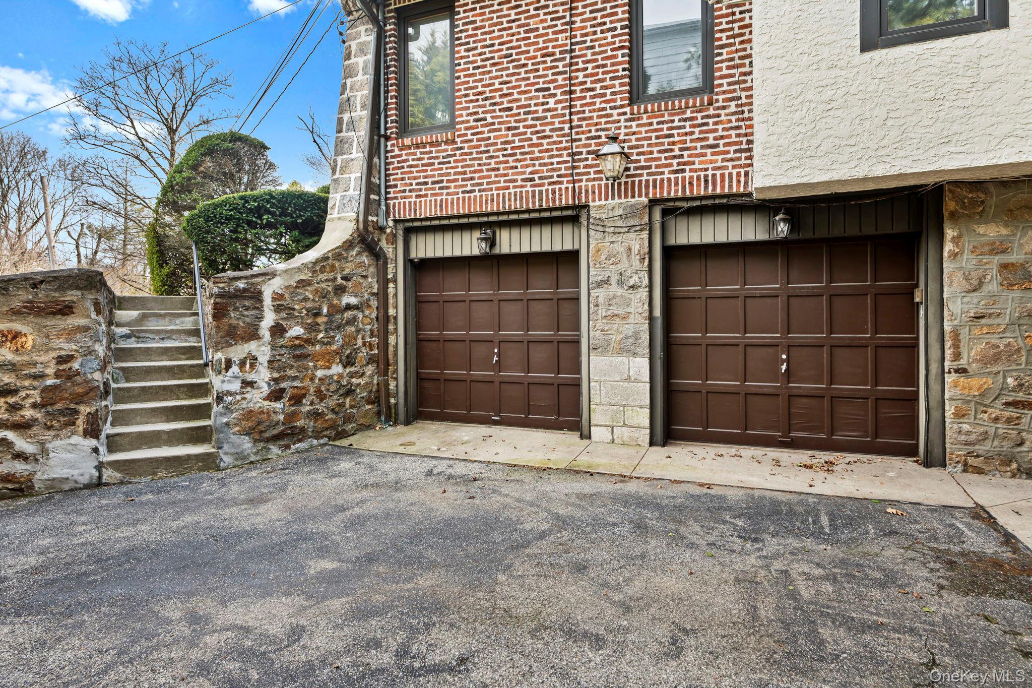 44 Fenimore Road New Rochelle, NY 10804 - Photo 35 of 46 a front view of a house with a yard