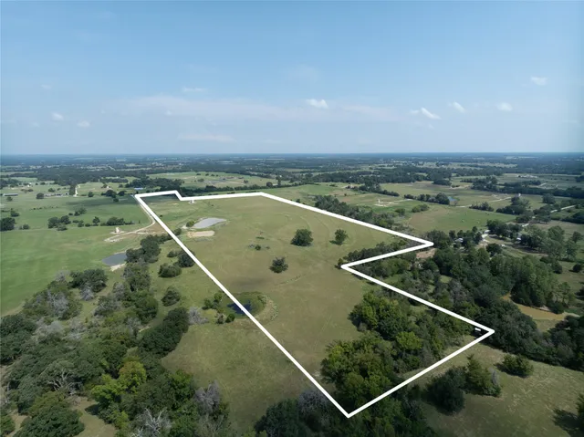 an aerial view of a tennis court