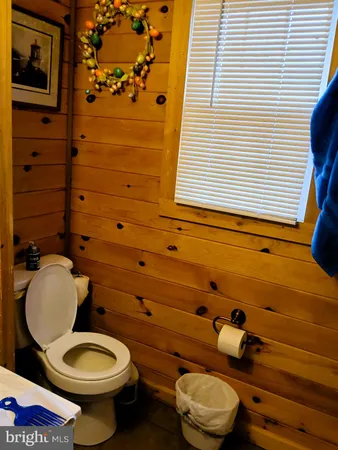 a bathroom with a toilet