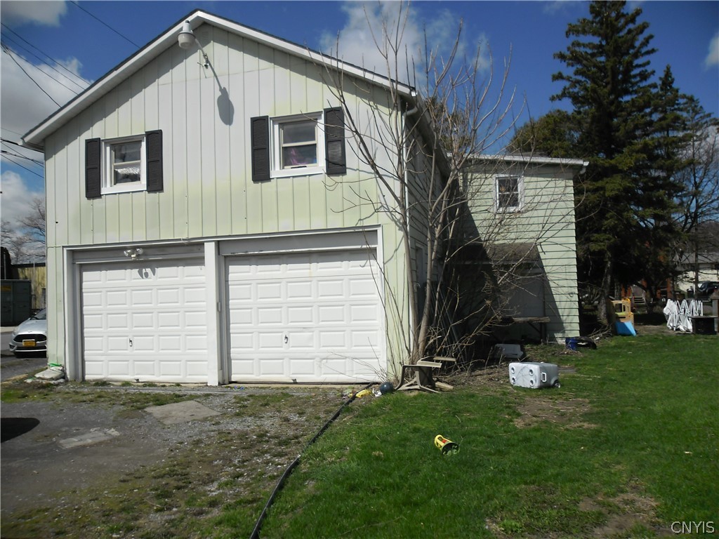 61 Border City Road Waterloo, NY 14456 - Photo 4 of 7 Sideview of home with 2 car garage and additional