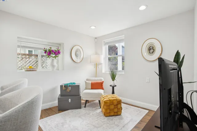 a living room with furniture and a table