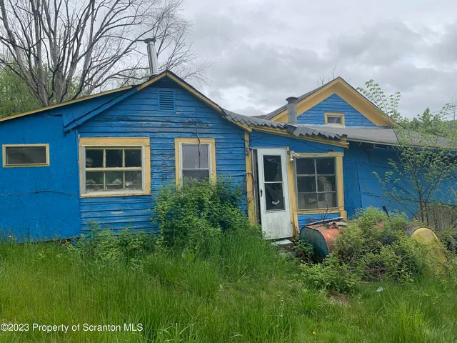 a view of front of a house with porch