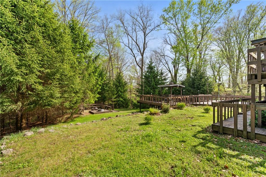 3132 Lake Road New Castle, PA 16102 - Photo 31 of 47 The backyard receives full sunlight throughout the day and would be perfect for a vegetable garden.