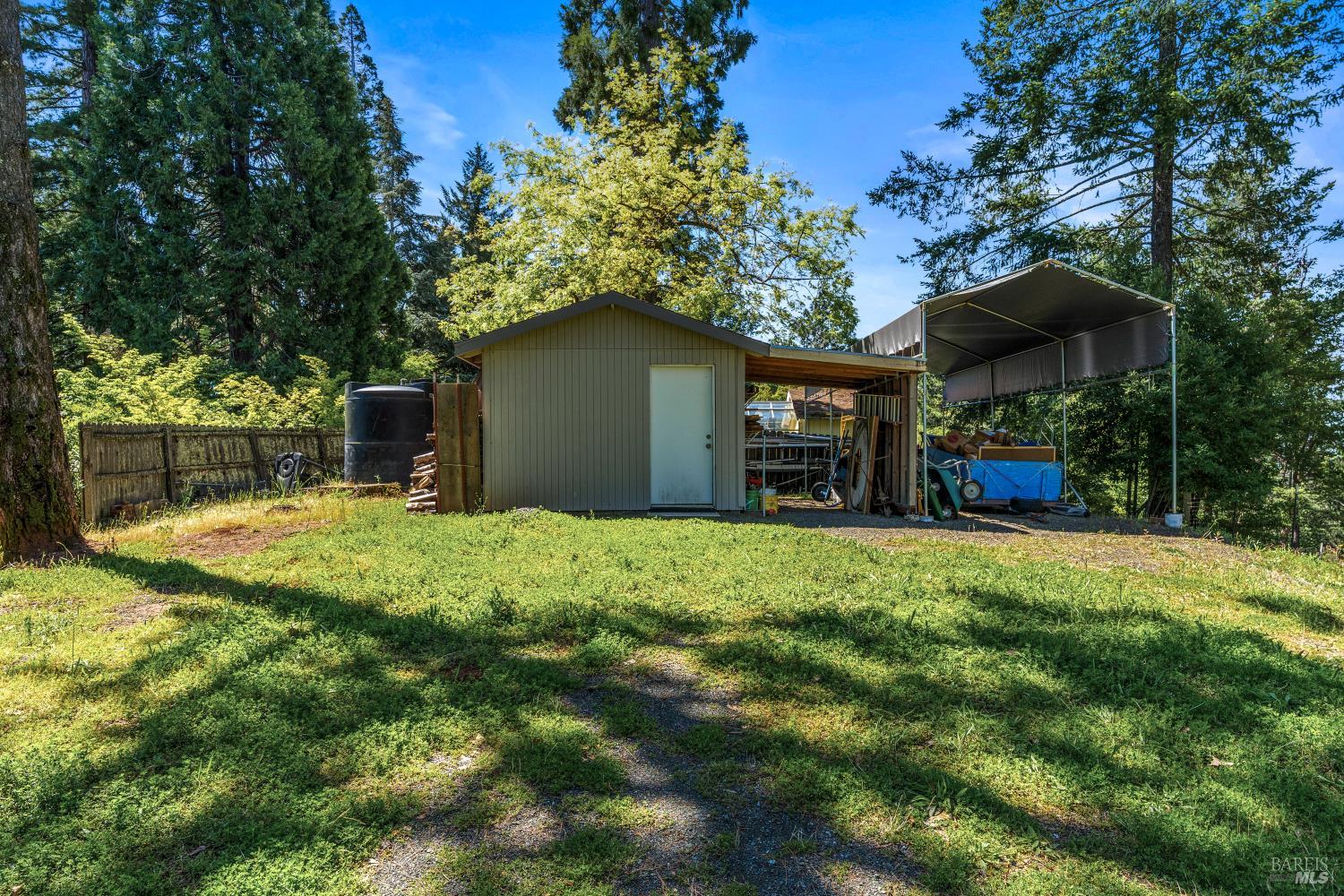 625-629 Hill Road Angwin, CA 94508 - Photo 58 of 64 a view of a house with backyard and garden