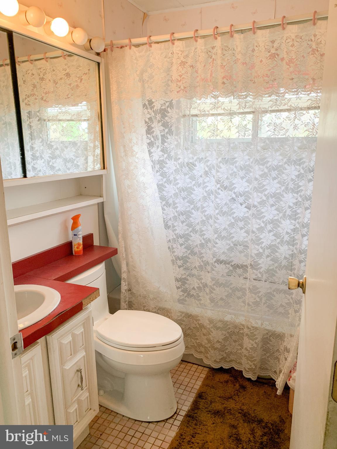 63 Queens Bridge Road Levittown, PA 19057 - Photo 7 of 18 Downstairs bathroom