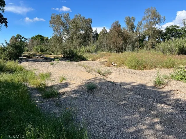 a view of a yard with a house
