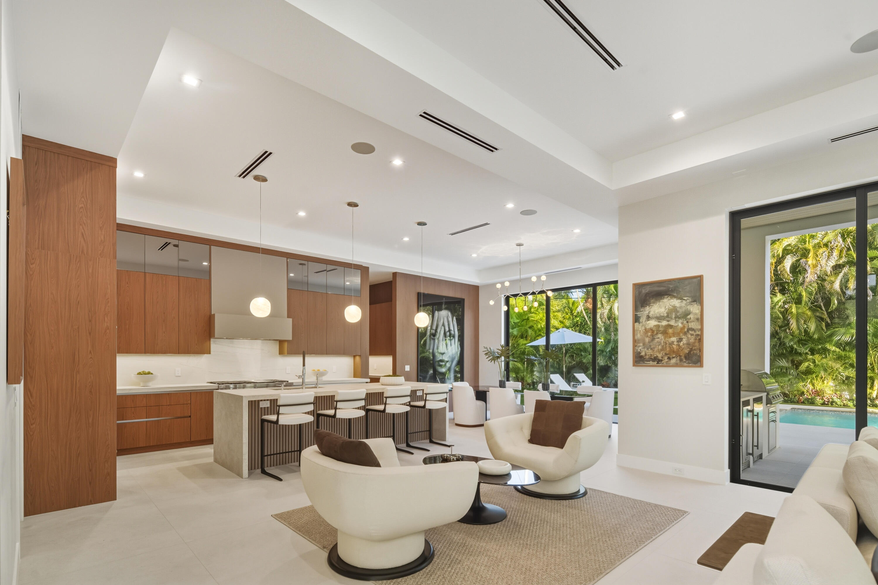 450 Northeast Spanish Court Boca Raton, FL 33432 - Photo 13 of 32 a living room with furniture and a large window