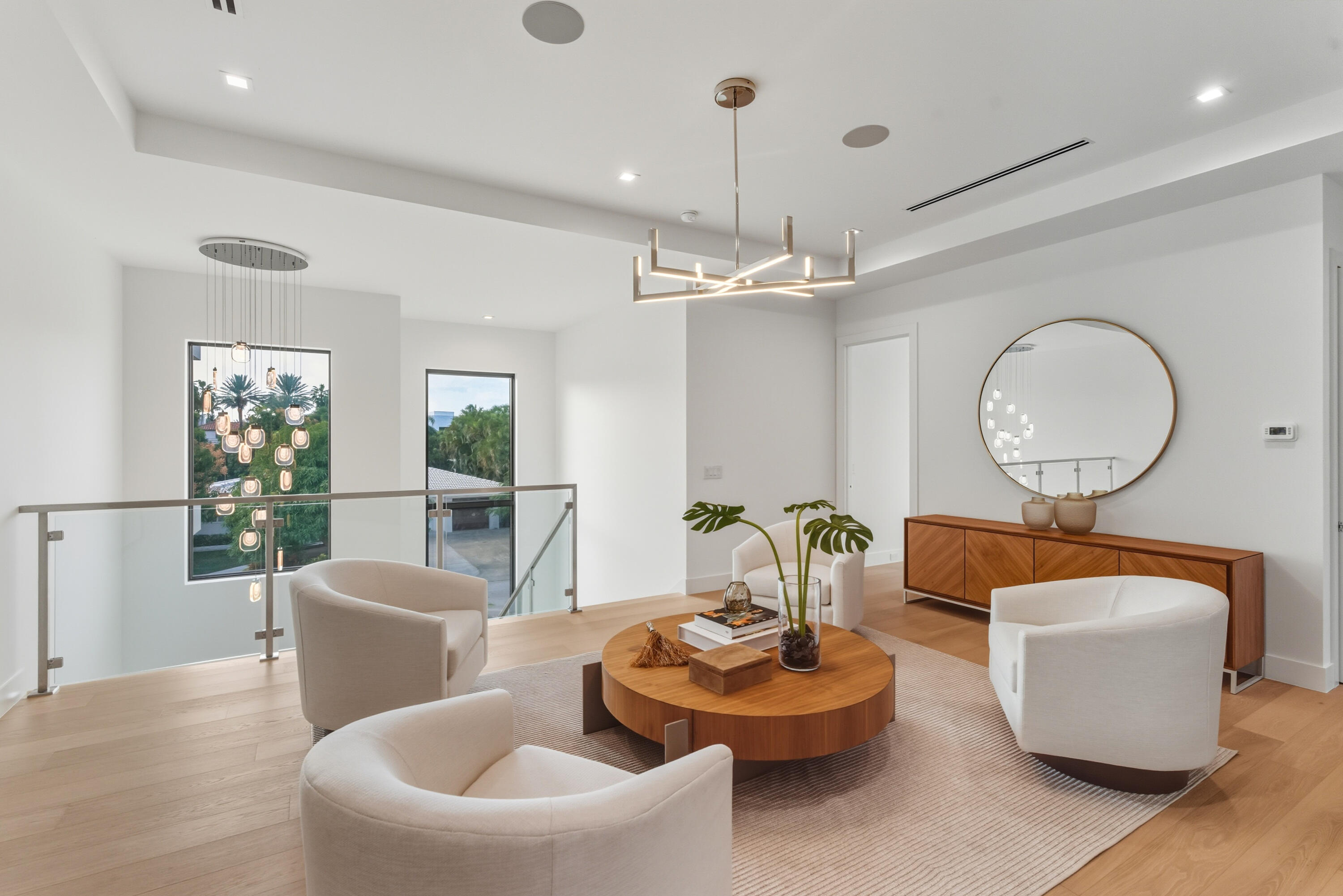450 Northeast Spanish Court Boca Raton, FL 33432 - Photo 16 of 32 a living room with fireplace furniture and a large window