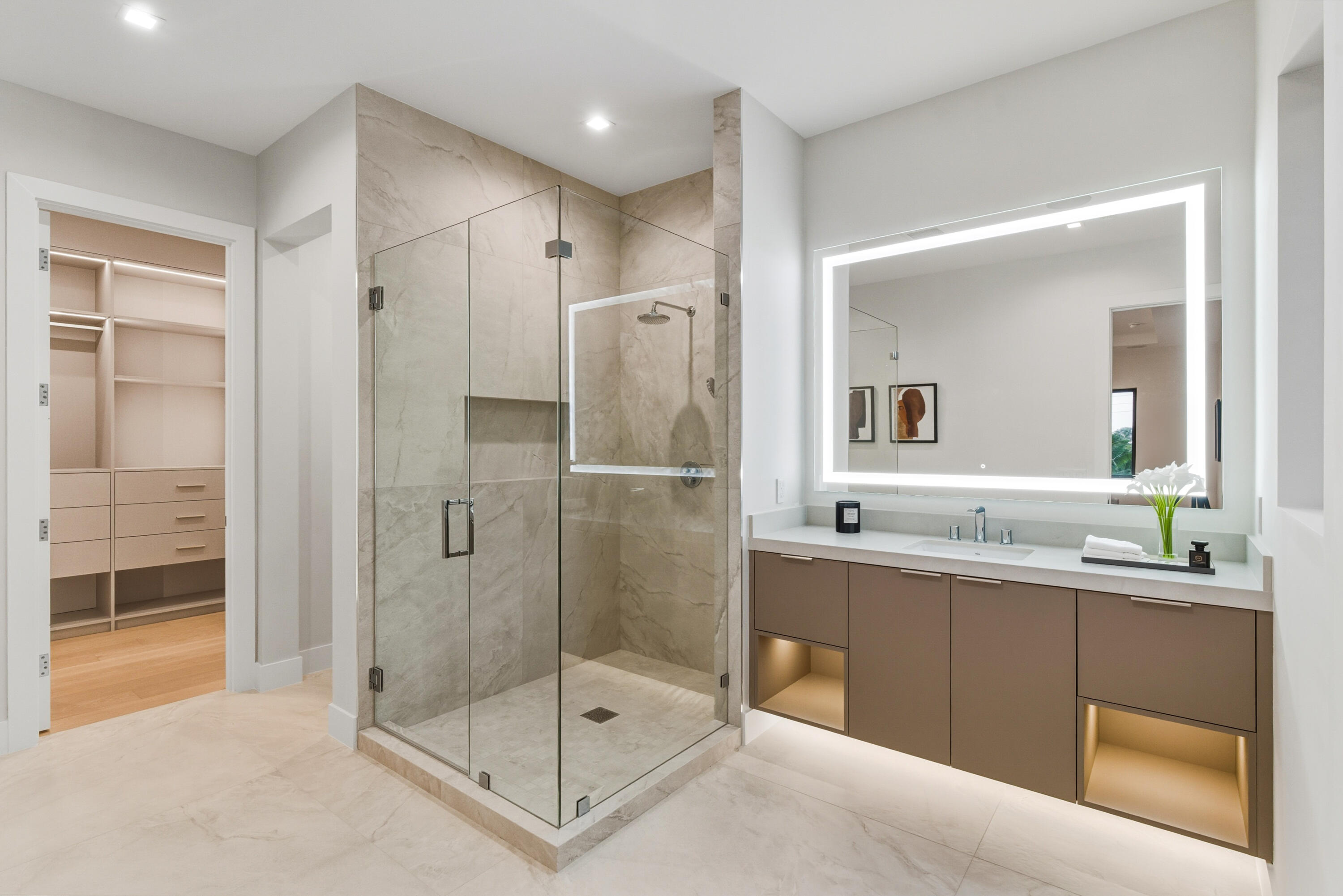 450 Northeast Spanish Court Boca Raton, FL 33432 - Photo 20 of 32 a bathroom with a shower sink and mirror