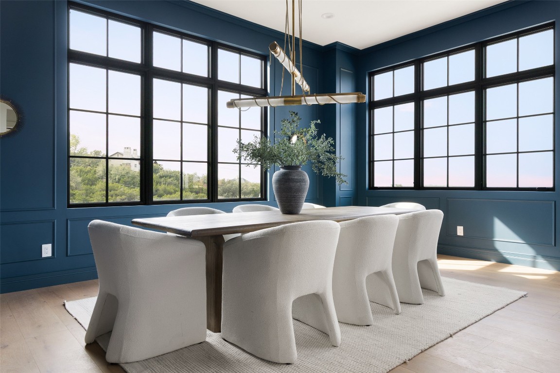 9117 Brookhurst Cove Austin, TX 78733 - Photo 13 of 40 a living room with large windows