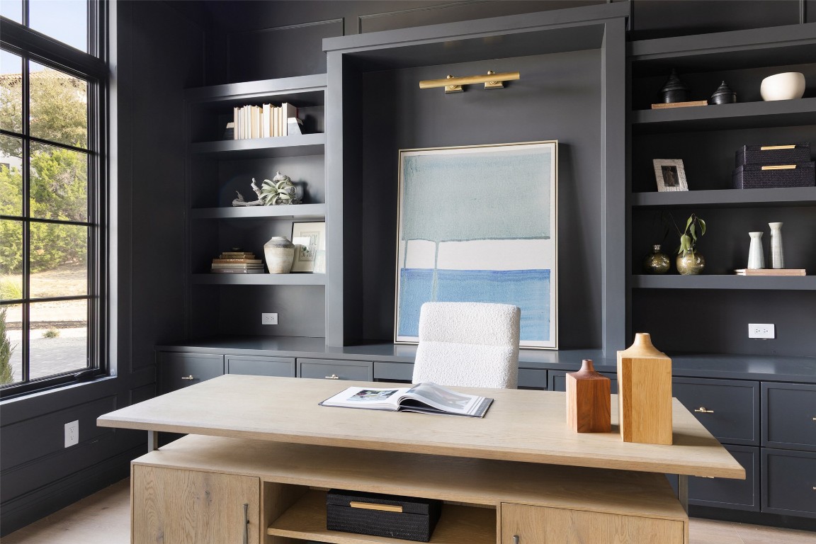 9117 Brookhurst Cove Austin, TX 78733 - Photo 5 of 40 a workspace with furniture and window