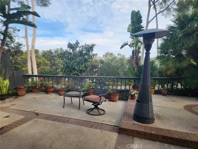 a view of a terrace with sitting area