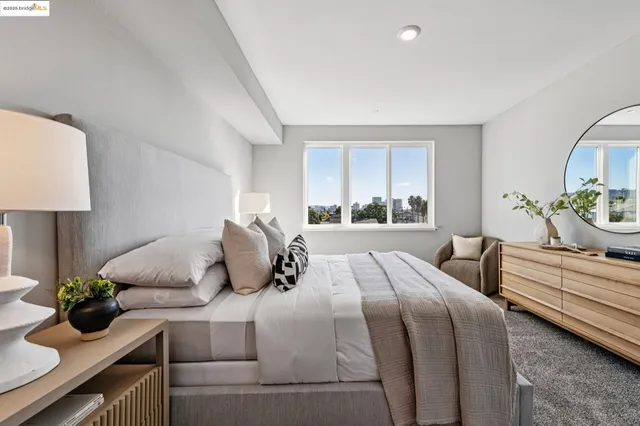 a bedroom with bed and window