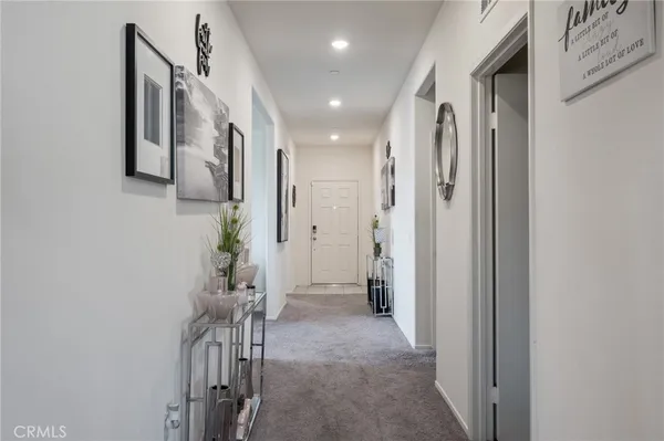 a view of entryway with livingroom