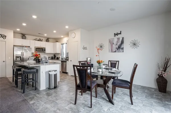 a view of a dining room with furniture