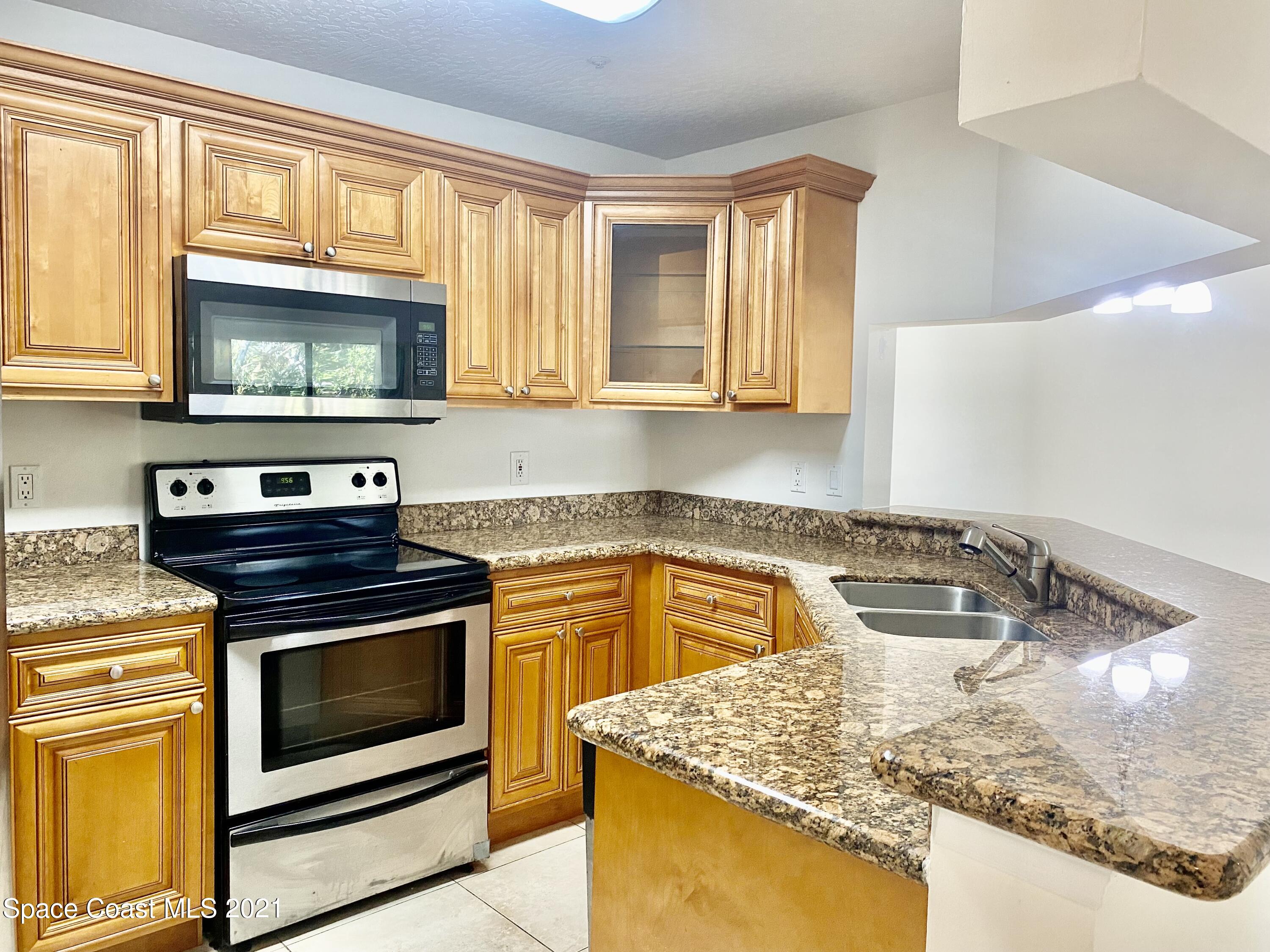 7667 North Wickham Road, Unit 117 Melbourne, FL 32940 - Photo 3 of 44 IMG_E0693
