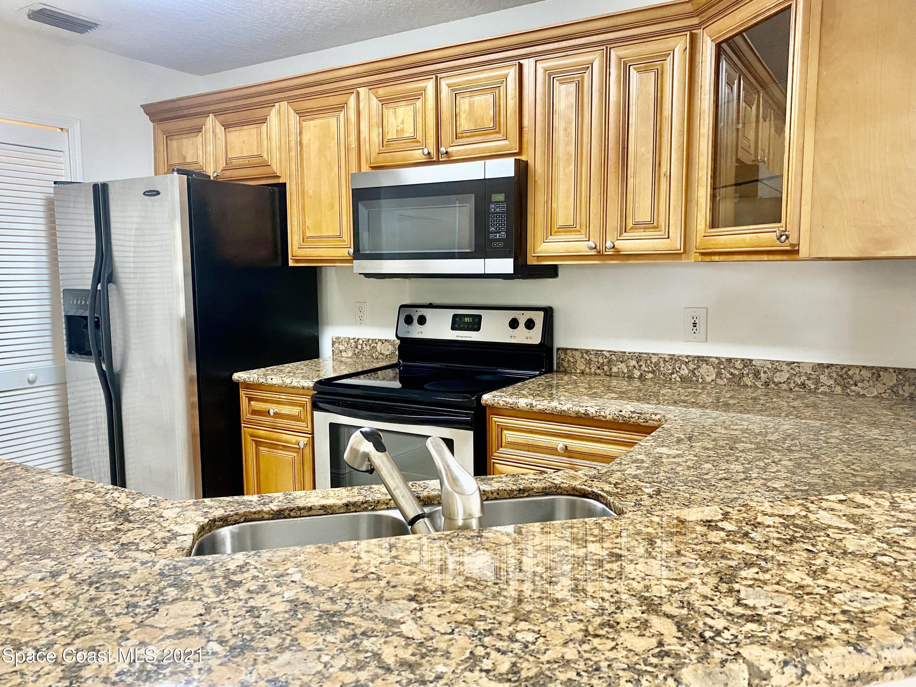 7667 North Wickham Road, Unit 117 Melbourne, FL 32940 - Photo 4 of 44 IMG_E0689