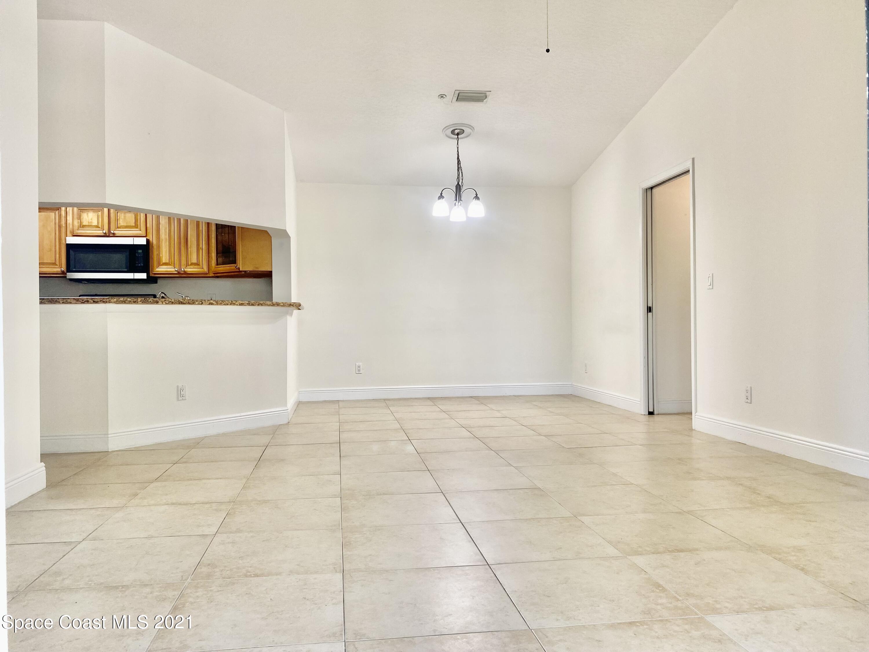 7667 North Wickham Road, Unit 117 Melbourne, FL 32940 - Photo 9 of 44 IMG_E0699