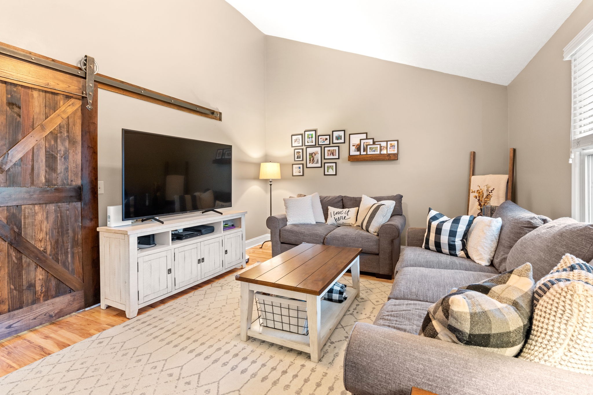 121 Ridgemar Trail Hendersonville, TN 37075 - Photo 19 of 46 a living room with furniture and a flat screen tv