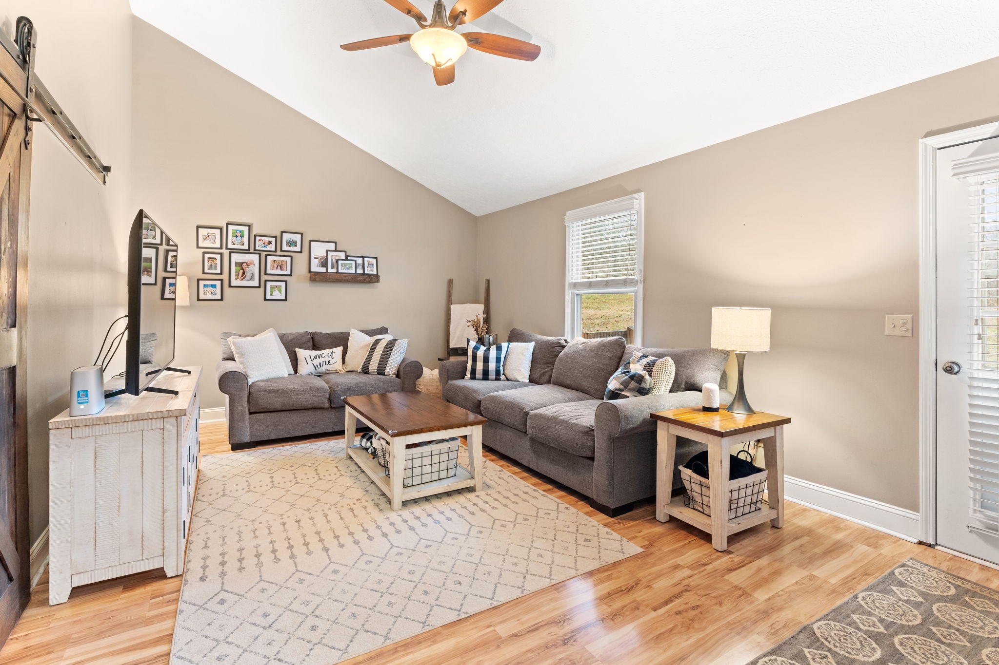 121 Ridgemar Trail Hendersonville, TN 37075 - Photo 20 of 46 a living room with furniture and a flat screen tv