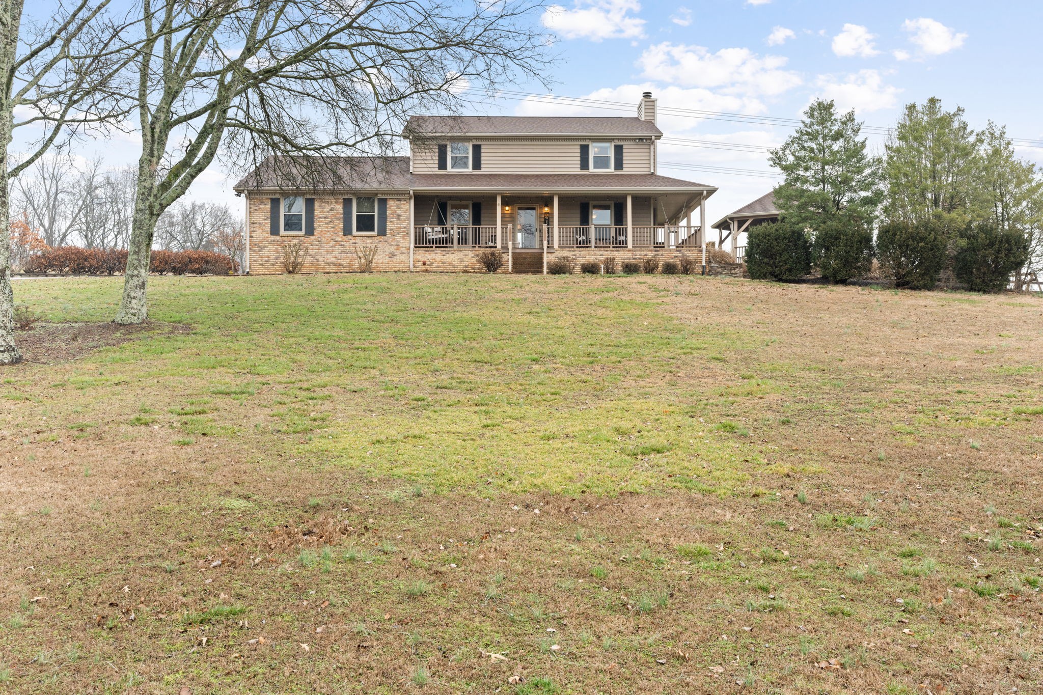 121 Ridgemar Trail Hendersonville, TN 37075 - Photo 2 of 46 a front view of a house with a yard