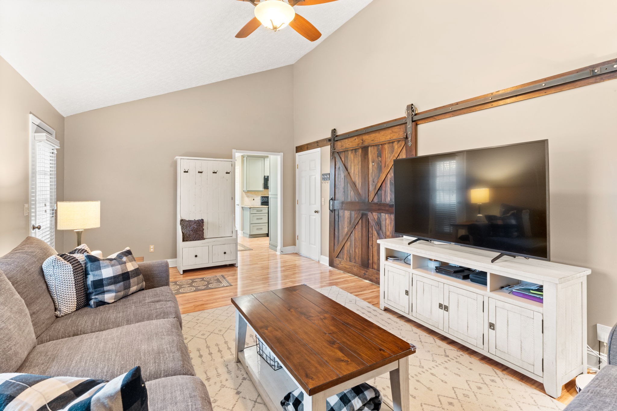 121 Ridgemar Trail Hendersonville, TN 37075 - Photo 21 of 46 a living room with furniture and a flat screen tv