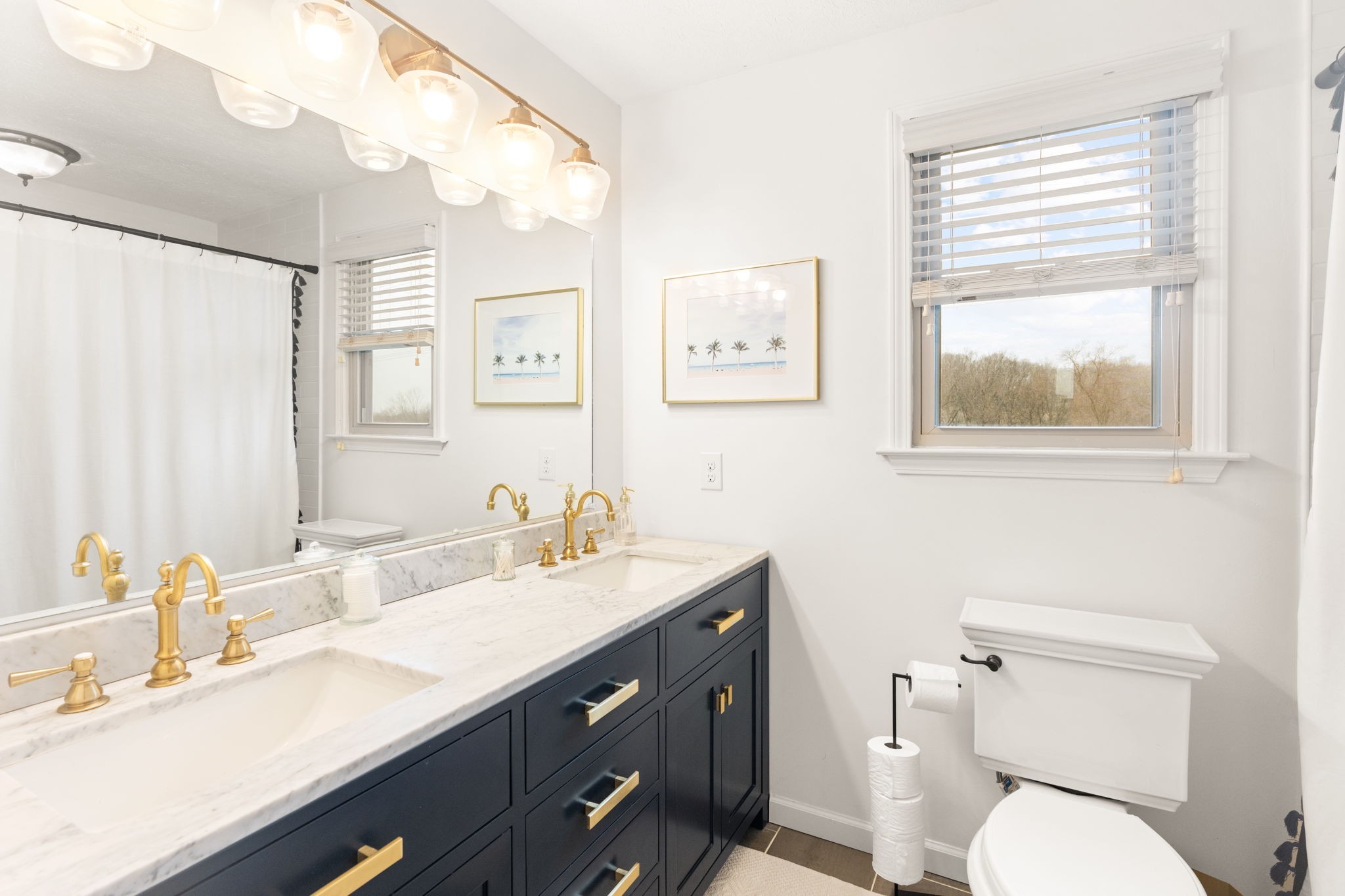 121 Ridgemar Trail Hendersonville, TN 37075 - Photo 25 of 46 a bathroom with a toilet a sink a mirror a and a window