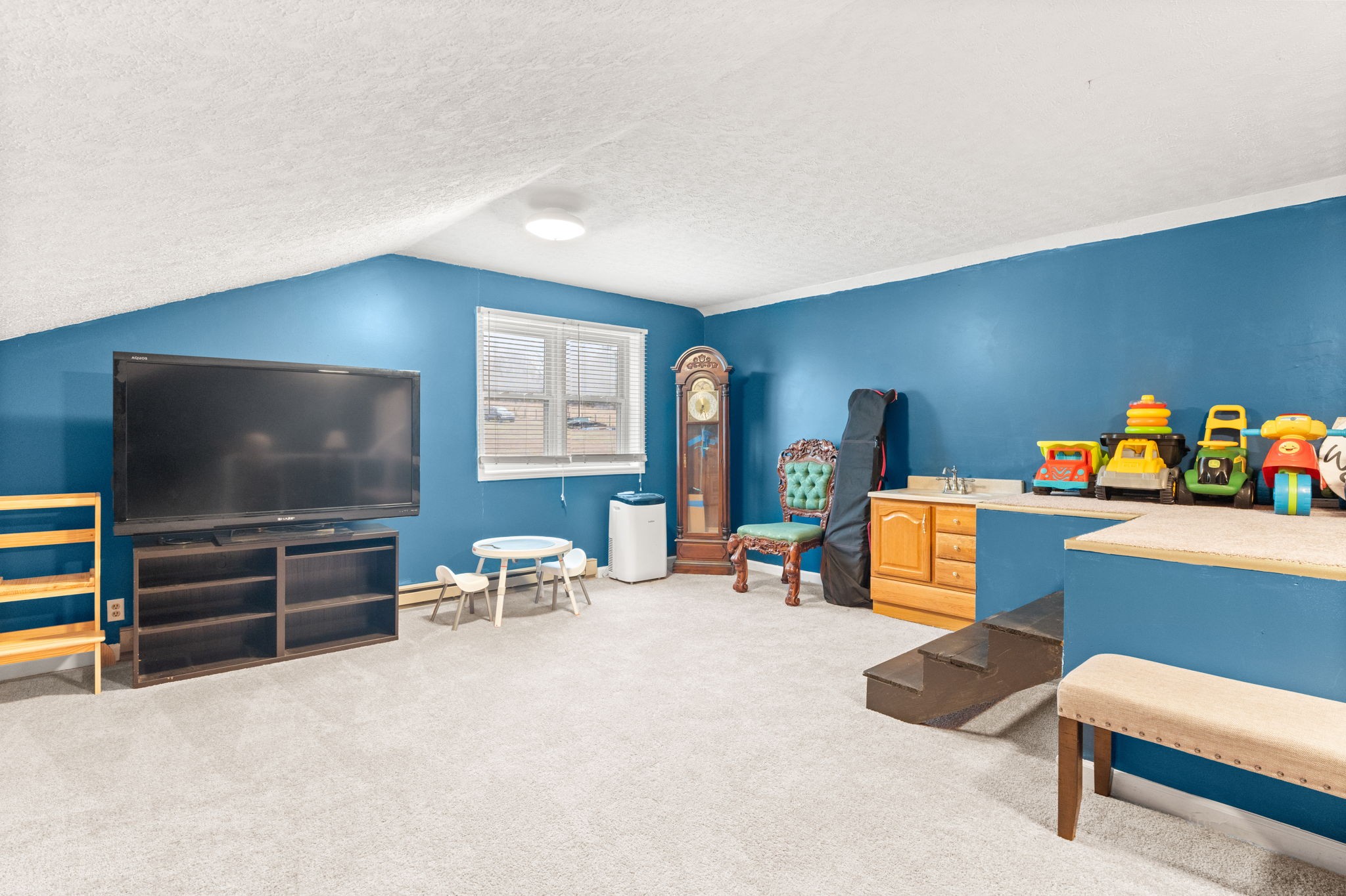 121 Ridgemar Trail Hendersonville, TN 37075 - Photo 30 of 46 a room with furniture and a flat screen tv