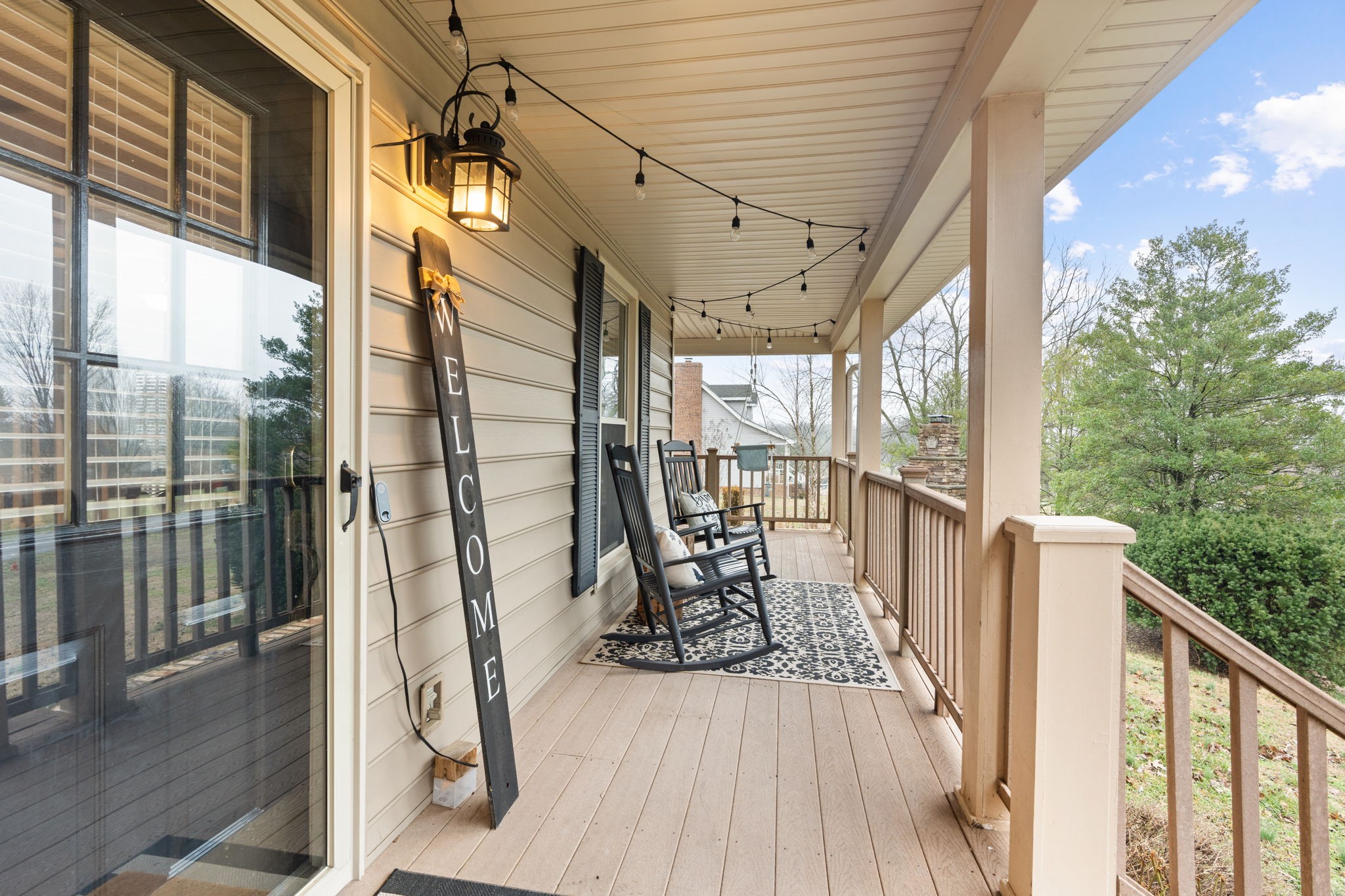 121 Ridgemar Trail Hendersonville, TN 37075 - Photo 6 of 46 a view of a balcony with chairs and wooden floor