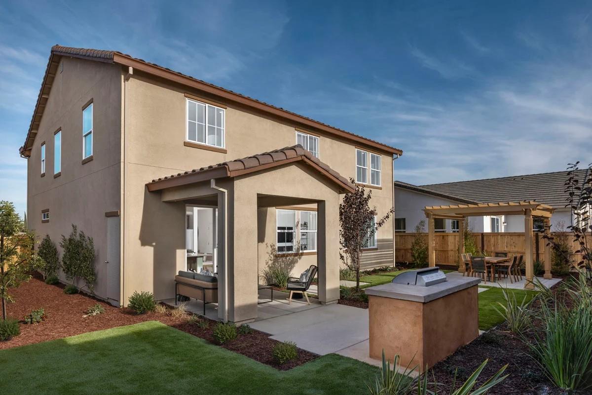 1701 Apiary Way Hughson, CA 95326 - Photo 11 of 13 a view of a house with backyard and sitting area