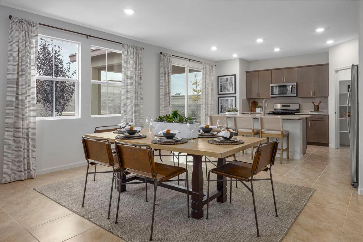 1701 Apiary Way Hughson, CA 95326 - Photo 5 of 13 a view of a dining room with furniture