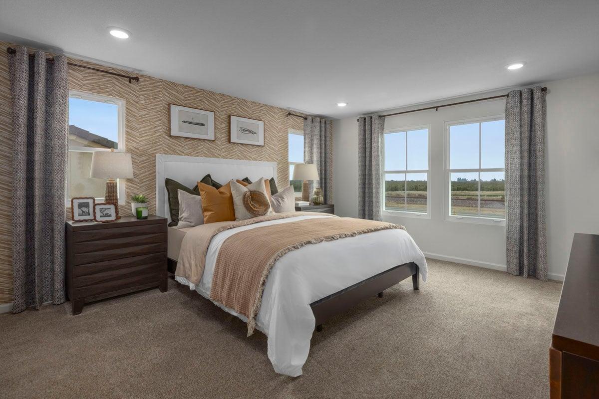 1701 Apiary Way Hughson, CA 95326 - Photo 8 of 13 a spacious bedroom with a bed and a window
