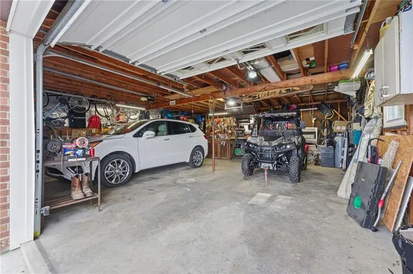 a view of a swimming pool with a yard