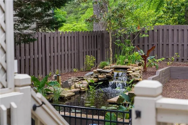 a view of a chair and tables in the patio