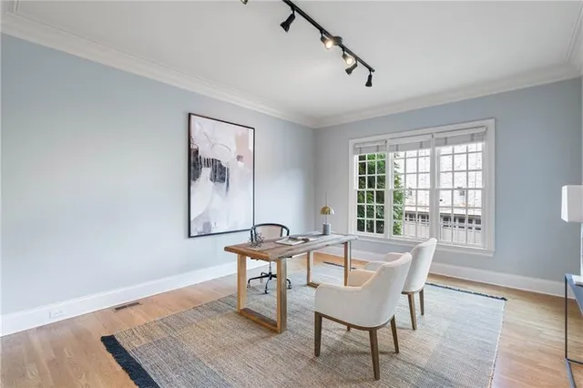 a view of a livingroom with furniture and window