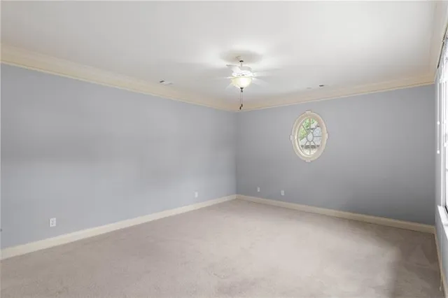 a bathroom with a granite countertop sink a toilet and bathtub