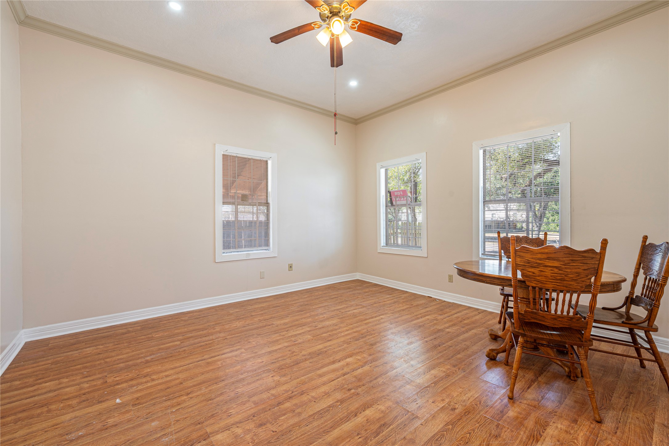307 York Street, Unit 4 Houston, TX 77003 - Photo 15 of 38 a workspace with wooden floor and a window