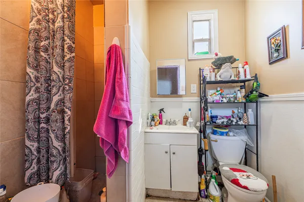 a bedroom with furniture and a bed