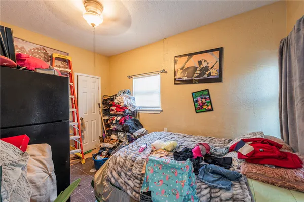 a bed room with a bed and furniture