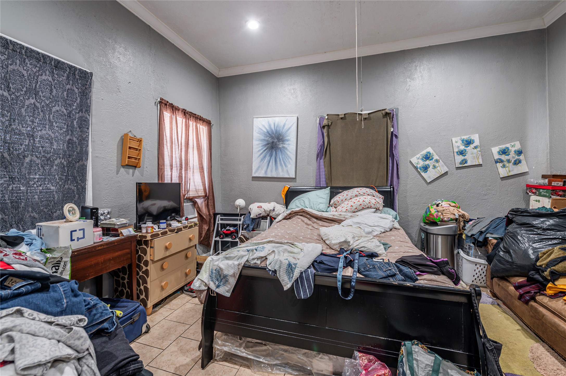 307 York Street, Unit 4 Houston, TX 77003 - Photo 24 of 38 a bed room with a bed and furniture