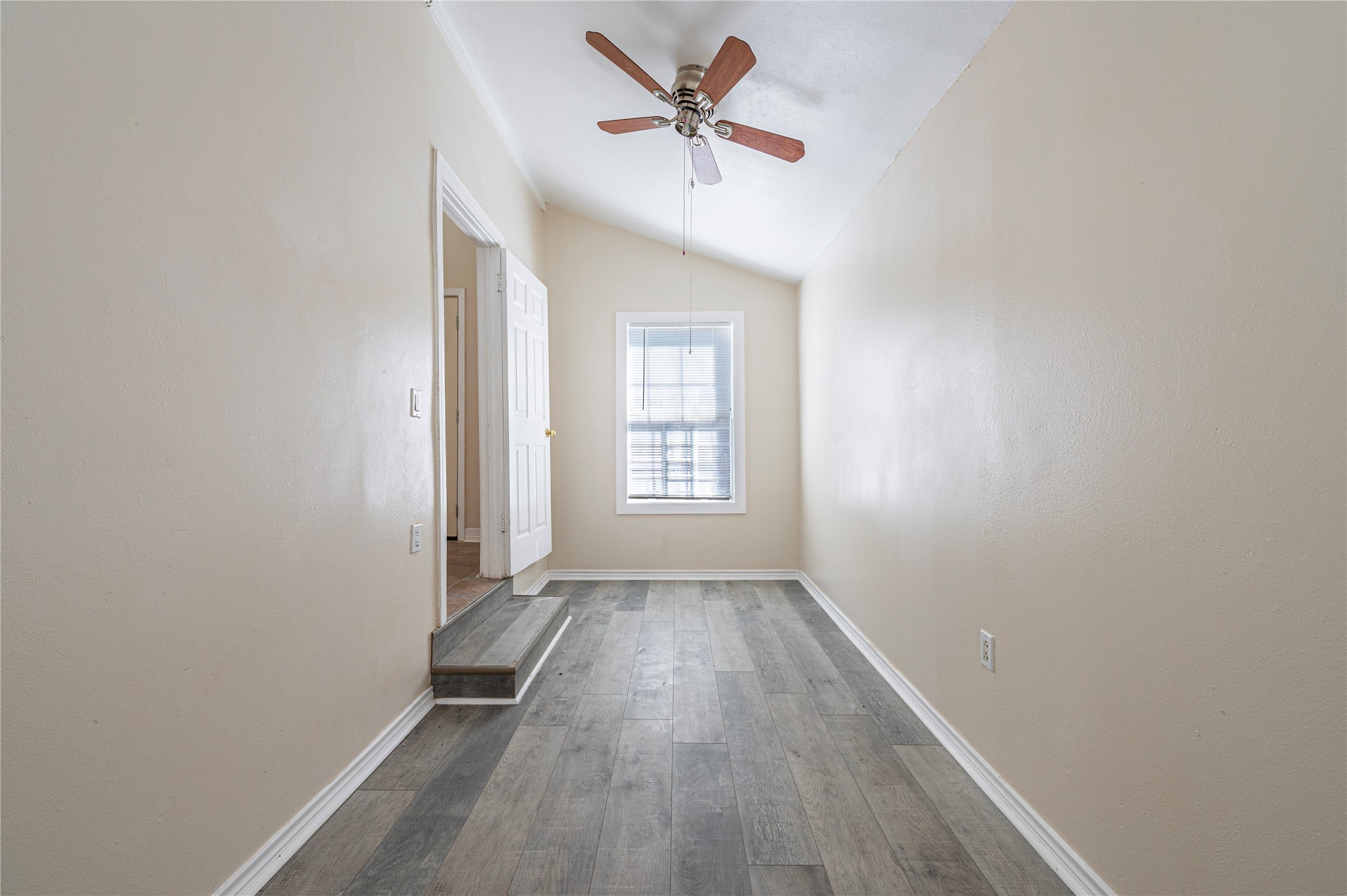 307 York Street, Unit 4 Houston, TX 77003 - Photo 28 of 38 wooden floor in an empty room with a window