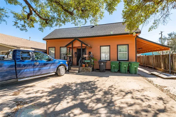 a view of a car park in front of a building