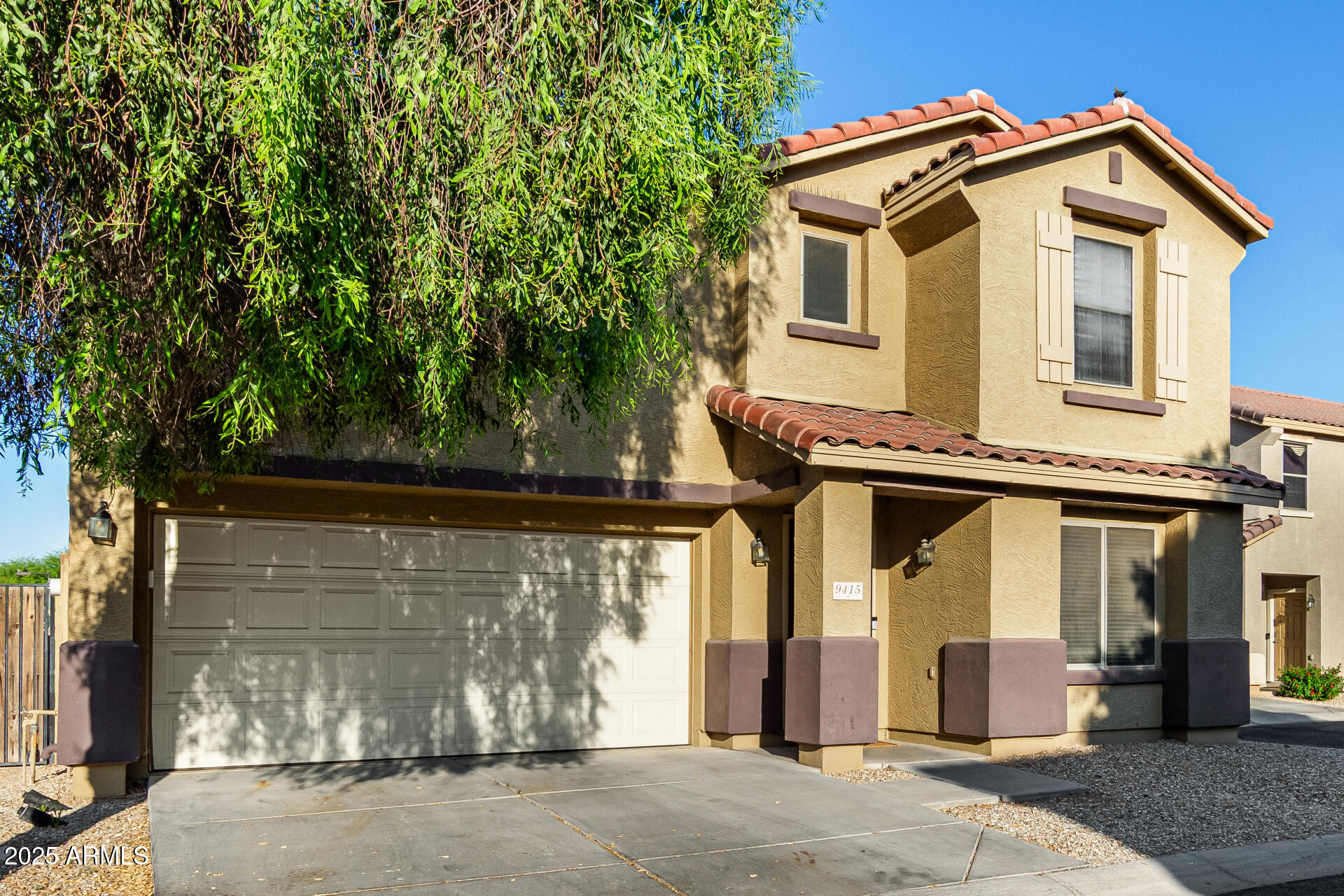 9415 West Eaton Road Phoenix, AZ 85037 - Photo 4 of 36 a front view of a house