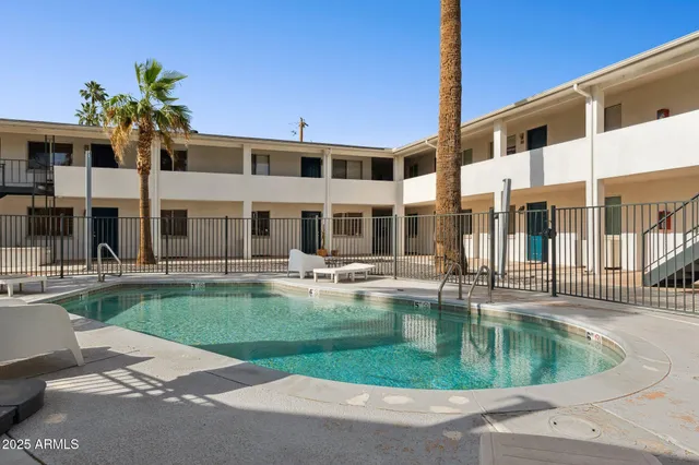 a view of a house with a swimming pool
