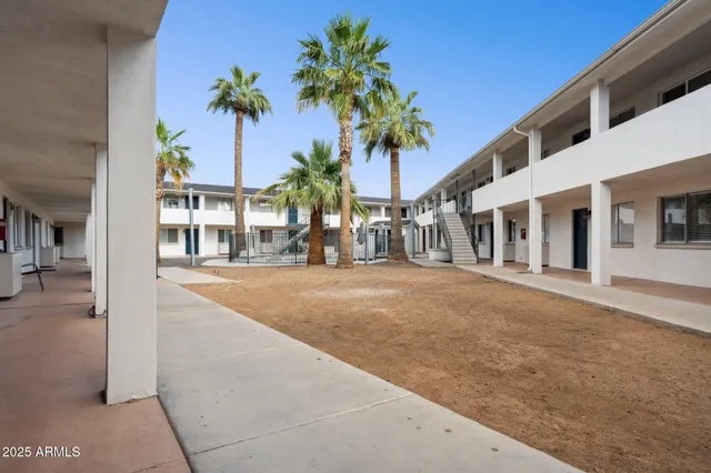 a view of a building with a street