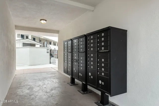 a view of a hallway with windows