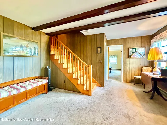 a workspace with furniture and a window