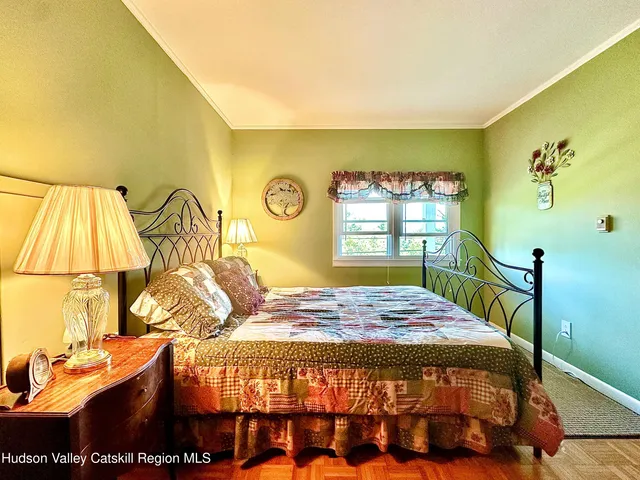 a bathroom with a bathtub and a window