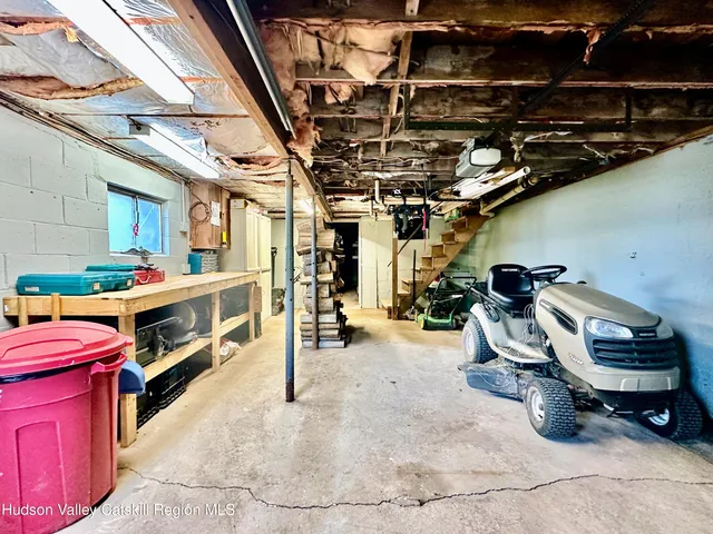 a view of house with backyard